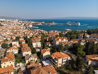 Split, Croatia, august 2019: Aerial view of Split city, Diocletian Palace and Mosor mountains in background. Split panoramic view of town, UNESCO World Heritage