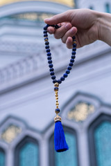 Male Hand with Islamic rosary close up - 283103236