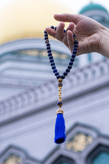 Male Hand with Islamic rosary close up - 283103249