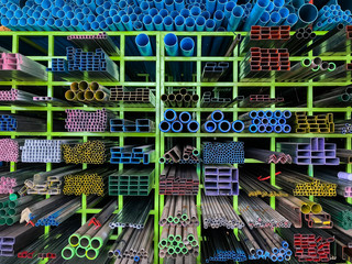 Shelves of different metal products and PVC tubes, pipe pvc  and  different metal products on the Shelves for construction.
