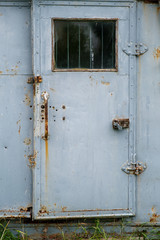 rusty iron door with window motor van