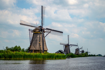 Naklejka premium Traditional Dutch windmills near the canal in Kinderdijk, Netherlands.