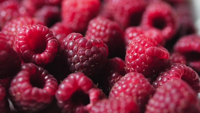 Close Up Rotation Loopable Berry. Fresh, Juicy Raspberry Background, Ripe. Macro Red Raspberries Fruit. Fresh Raspberry Fruits As Food Dackground. Healthy Food Organic Nutrition.