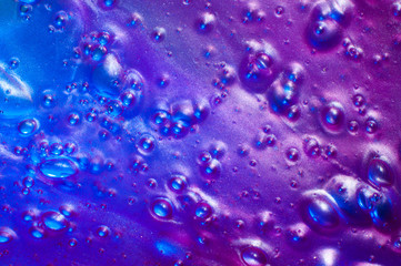 Liquid art gel blue and violet background with bubbles