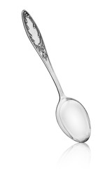 Silver spoon with reflection on isolated white background