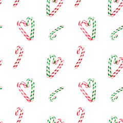 Watercolor Christmas seamless pattern with hand drawn candy cane, isolated on white background. Green and red traditional winter holiday treats for seasonal design, cards, textile, wallpapers.