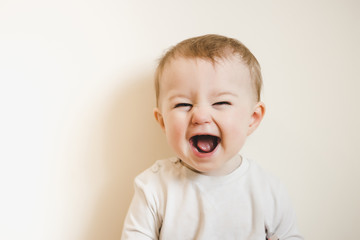 Baby with flu laughing - obrazy, fototapety, plakaty