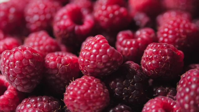 Close Up Berry. Fresh, Juicy Raspberry Background, Ripe. Macro Red Raspberries Fruit. Fresh Raspberry Fruits As Food Dackground. Healthy Food Organic Nutrition.