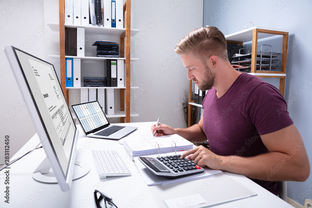 Canvas Prints businessman checking invoice on laptop