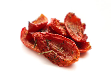 Sun dried tomatoes isolated on white