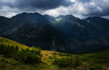 Dark clouds on a mountain ridge