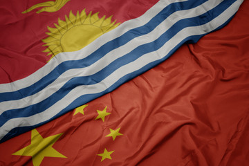 Fototapeta na wymiar waving colorful flag of china and national flag of Kiribati.