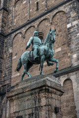 Fototapeta premium Monument of Otto von Bismarck, German Chancellor in front of Cathedral in Bremen, Germany, Autumn