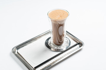 hot chocolate with cinnamon on the white background