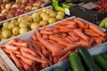 Closeup of organic carrots stack at the market