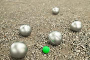 Petanque balls in the playing field.
