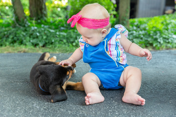 Baby with puppy