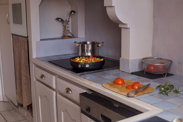 Cut vegetables process cooking for concept design yellow pepper and tomatoes
