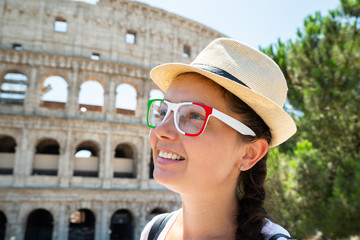 Female Tourist In Front Of Colosseum