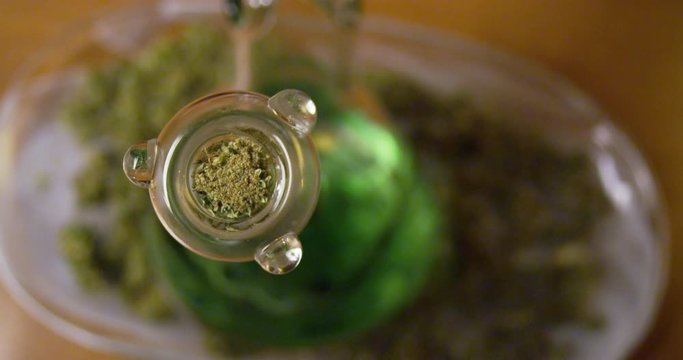 Large bowl of marijuana packed in a bong - extreme closeup - shot on RED
