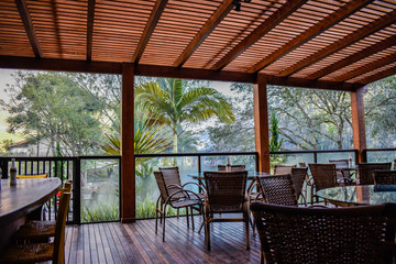 table and chairs pergola in garden
