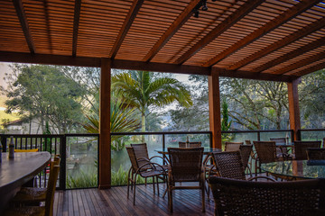 table and chairs pergola in garden