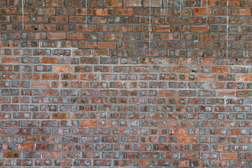 red brick wall at square format as background and texture