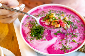 Girl eating healthy brunch breakfast. Detox diet. Vegan food. Green healthy food concept.