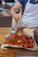 Process of stuffing vegetables with meat rustic decor homemade concept