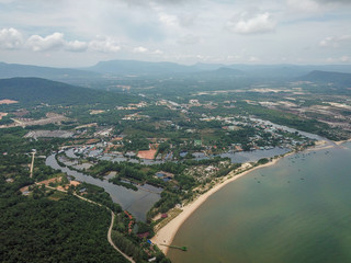 Fototapeta na wymiar Aerial view of Phu Quoc coastline little village during grey clouded day. Vietnam.