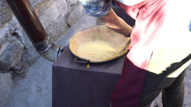 very rare video of traditional polenta in Rango Trentino town in Italy