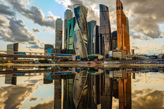 Moscow. The business center of the capital of Russia. Evening city with clouds. Moscow City. Walk along the Presnenskaya embankment at sunset. Russian architecture. High-rise buildings in Moscow