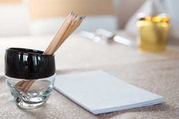 Selective focus of Pencil and paper on the table in the seminar room