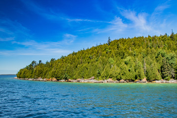 Great summer scene of water, rocks, and the sky, Lake Huron, ON