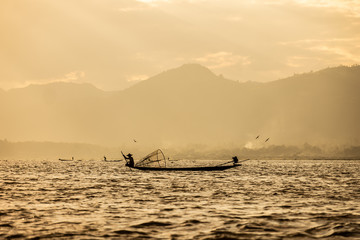 Fototapeta premium traditional fishing on Inle Lake