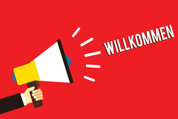 Word writing text Willkommen. Business concept for welcoming people event or your home something to that effect Man holding megaphone loudspeaker red background message speaking loud