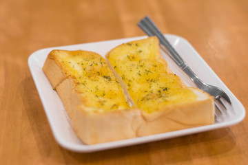 crepe with banana and chocolate,Fresh homemade crepes with strawberries and chocolate sauce on rustic wooden background. Top view.