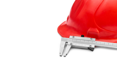 Safety hard hat with vernier caliper on white. Space for text.