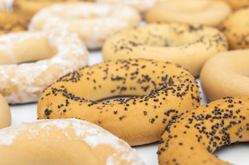 Food background of dried bagels on white.