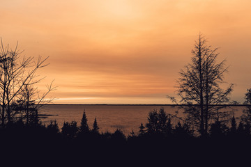 Fototapeta premium beautiful warm summer pink sunset by the Lae Michigan