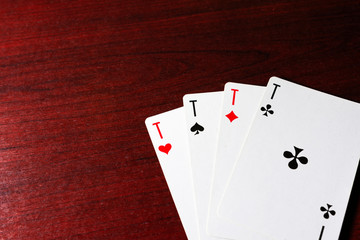 Game cards on the table, table texture red