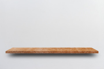 Front view empty wooden shelf and grey wall. Design concept