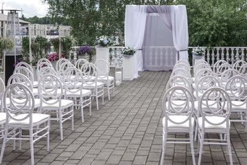Wedding arch and chairs