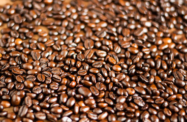 Freshly medium roasted coffee beans background