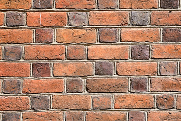 Obraz premium Background from a red brick wall of an old church