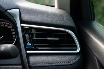 Car air conditioning panel on the luxury car console
