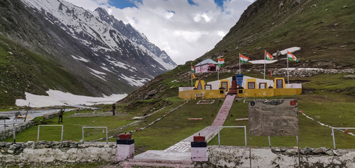 Jammu and Kashmir, India - June 16 2019: Zojila war memorial during a snowy day. During the Indo-Pakistani War of 1947, Zoji La was seized by Pakistani supported invaders in 1948.