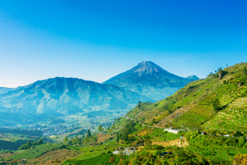 Dieng Plateau with Mount Sindoro background