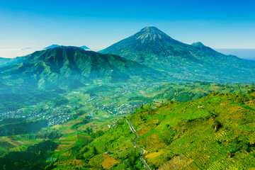 Village in Dieng Plateau with Mount Sindoro