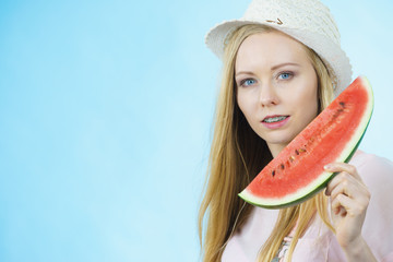 woman holding watermelon fruit